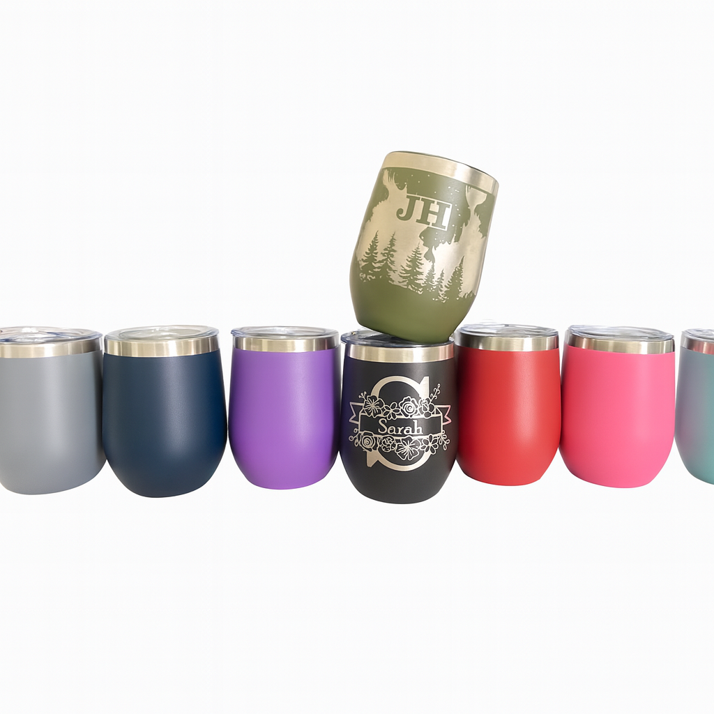 Set of colorful insulated tumblers with engraved designs 